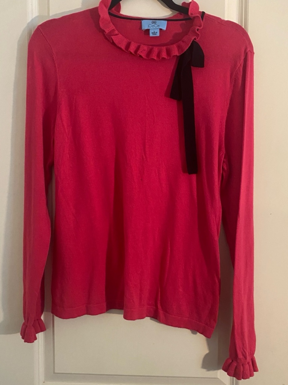 CeCe Hot Pink Long Sleeve Ruffle Neck Sweater with Black Bow